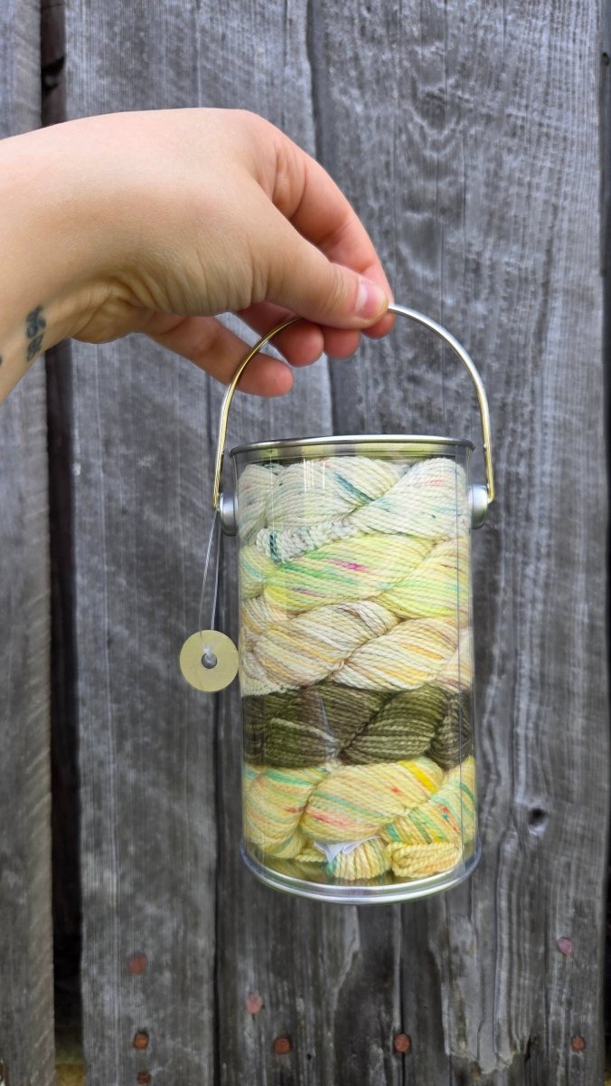 Mayflower (Nova Scotia) provincial flowers paint cans by Koigu Wool Designs at Wabi Sabi