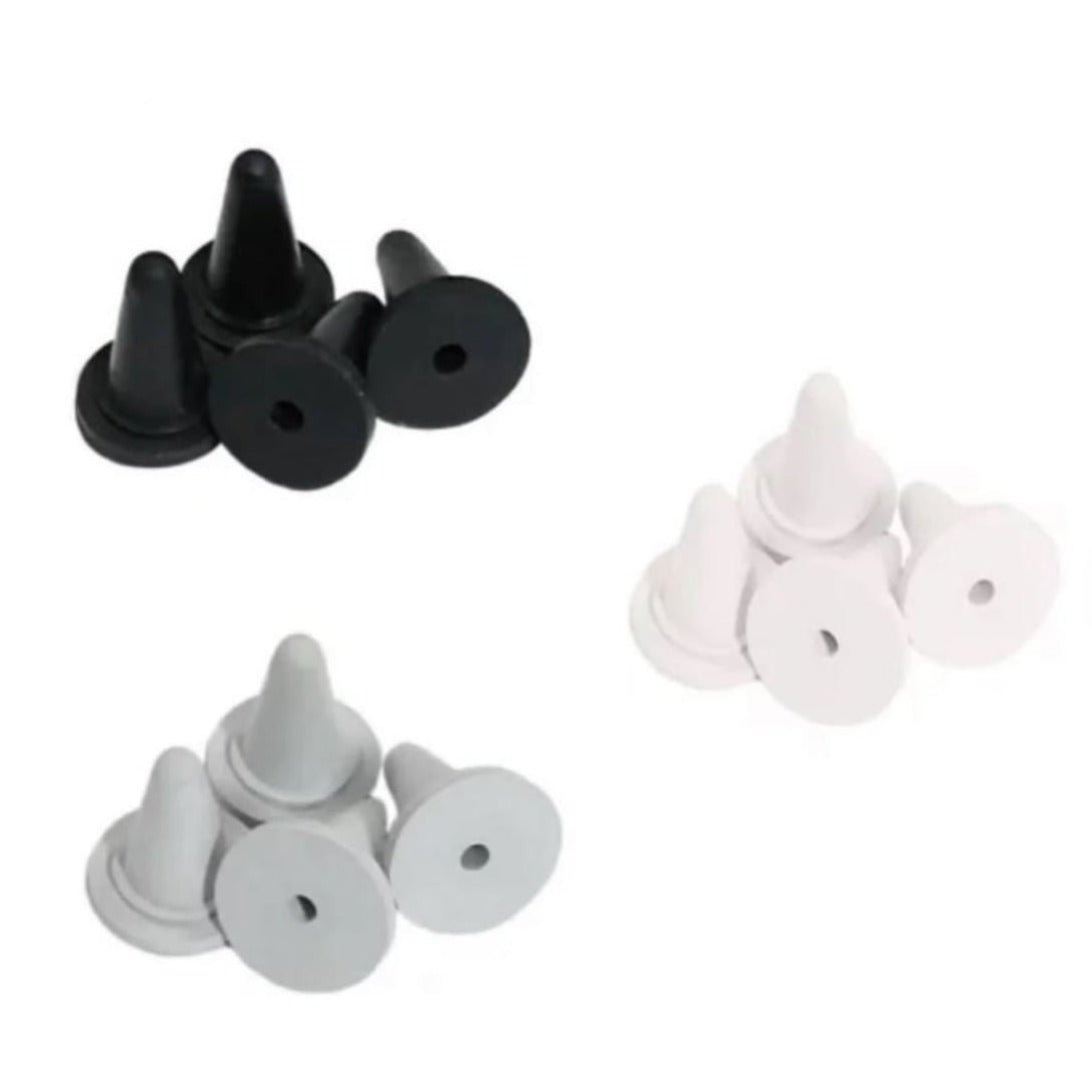 white (2mm - 4mm) rubber point protectors by seeknit at Wabi Sabi