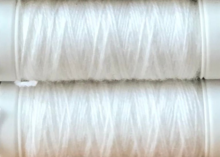 0001 White mending / reinforcing yarn by lang at Wabi Sabi